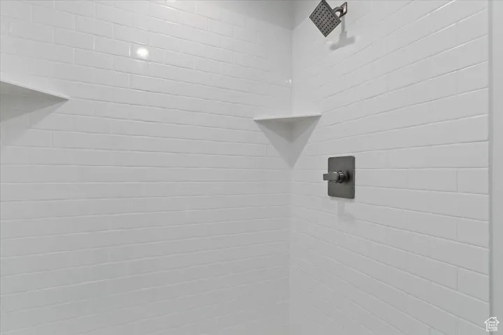 Details featuring tiled shower