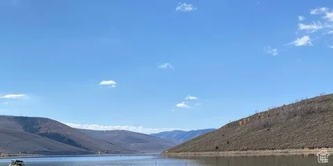 View of mountain feature with a water view
