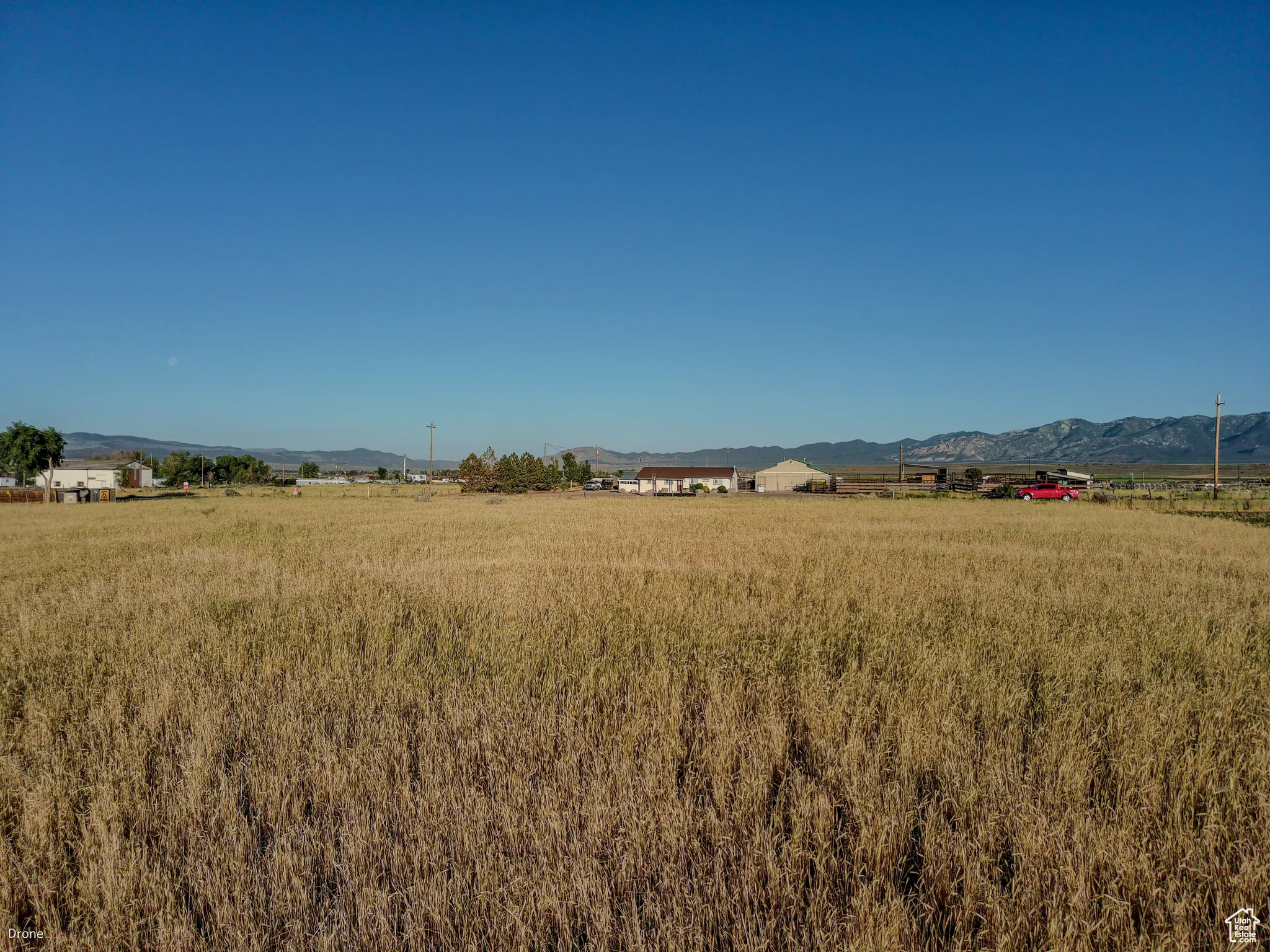 View of yard featuring a rural view and a mountain view