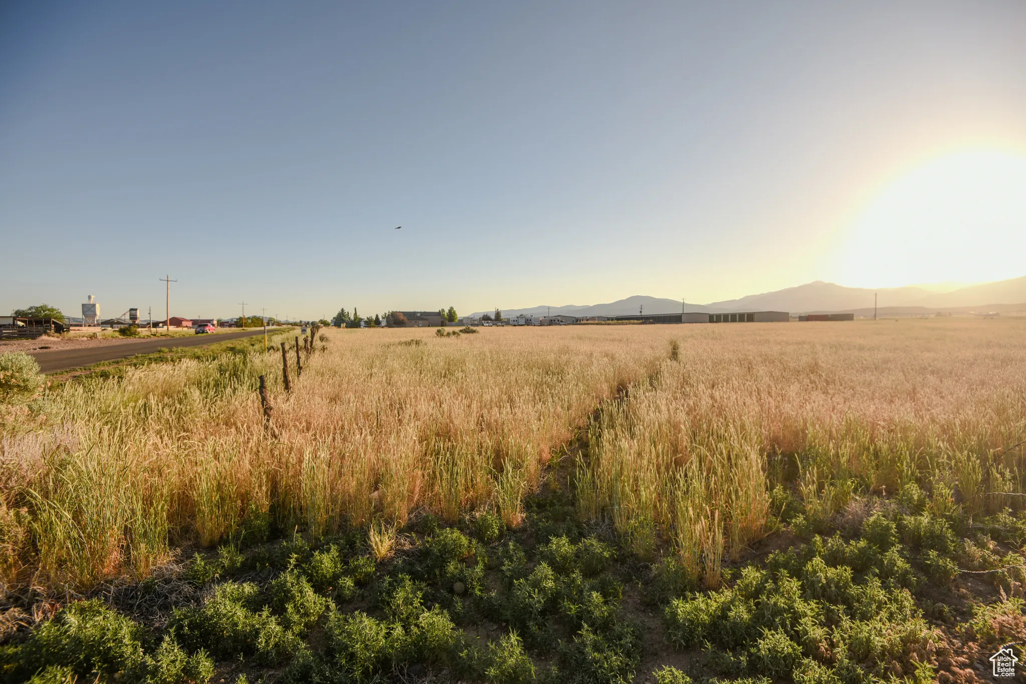 View of undeveloped land with rural landscape and mountains