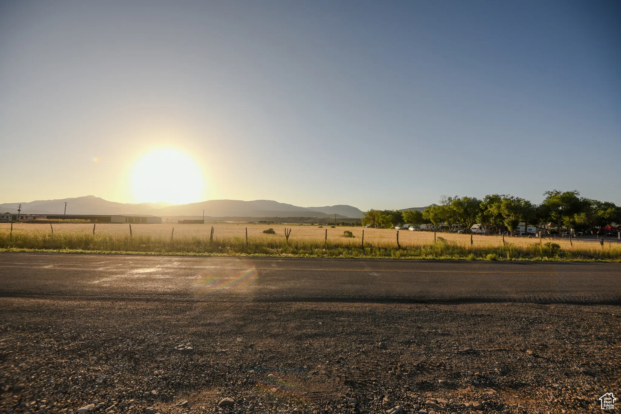 View of yard with a mountain view and a view of rural / pastoral area