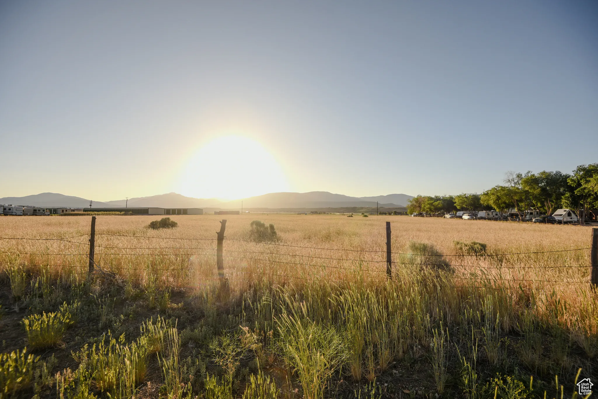 View of yard with a mountain view and a view of rural / pastoral area