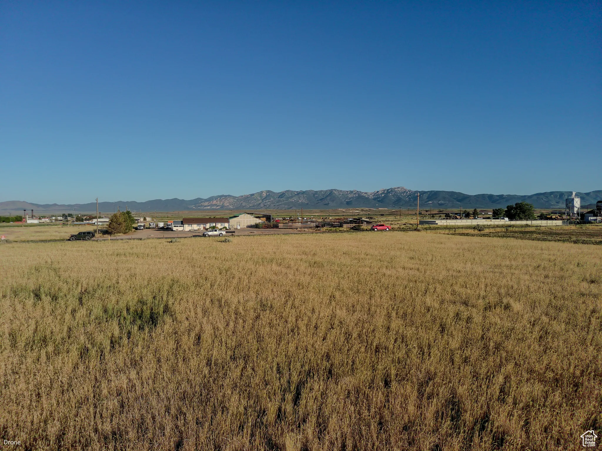 View of mountain background featuring rural landscape