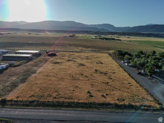 View of mountain background featuring rural landscape and extensive farmland