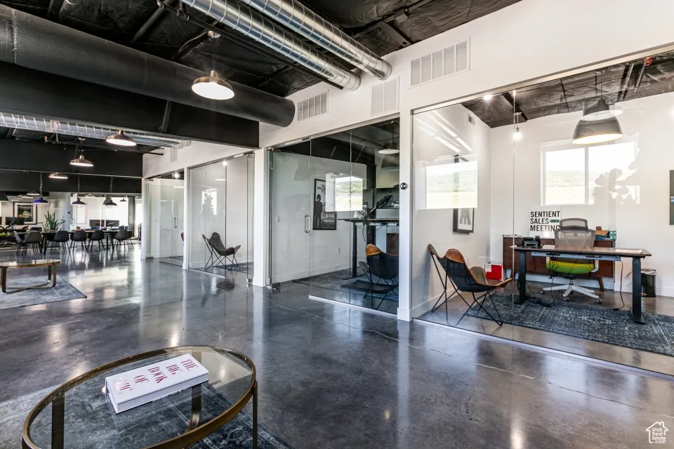 Interior space featuring baseboards and visible vents