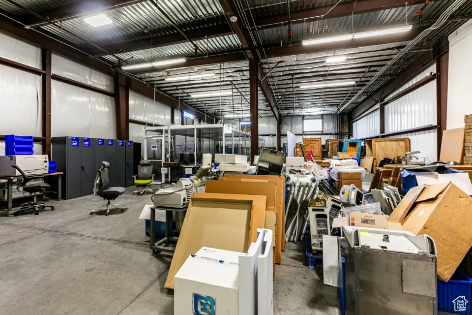 Garage featuring metal wall