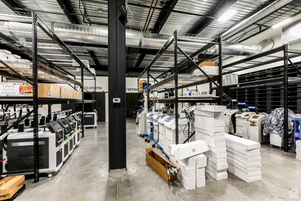 Interior space featuring concrete flooring