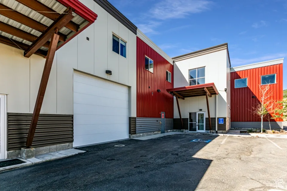 Rear view of house featuring board and batten siding