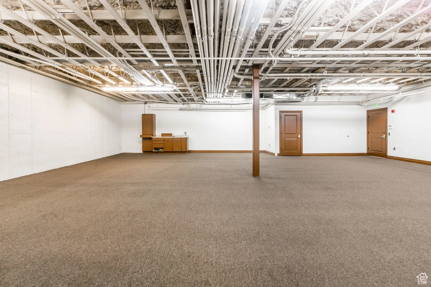 Below grade area featuring carpet flooring