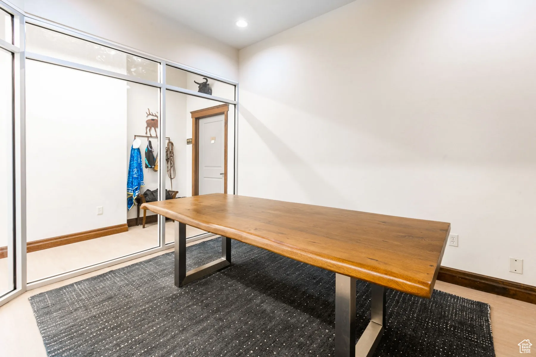 Office space with baseboards and recessed lighting