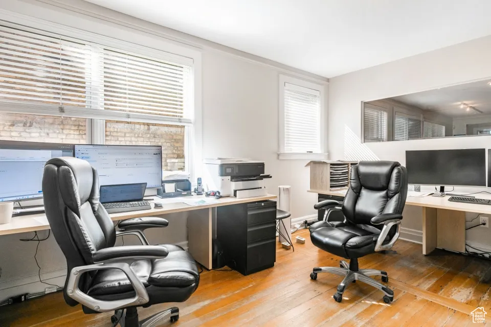 Office featuring baseboards and hardwood / wood-style floors