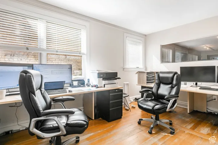 Office featuring baseboards and hardwood / wood-style floors