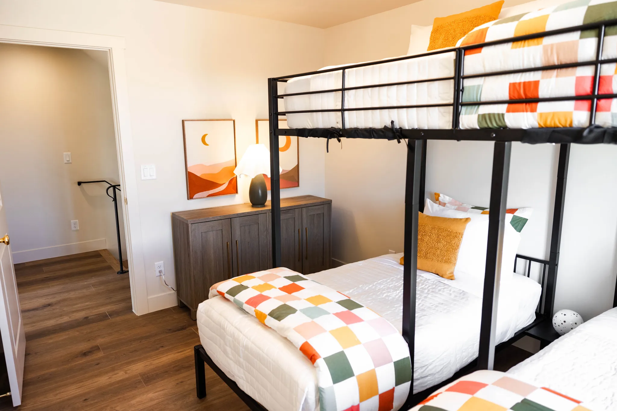 Bedroom with baseboards and wood finished floors