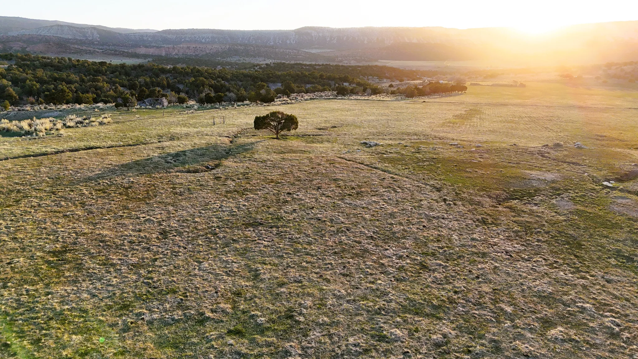 Aerial view of sparsely populated area with mountains
