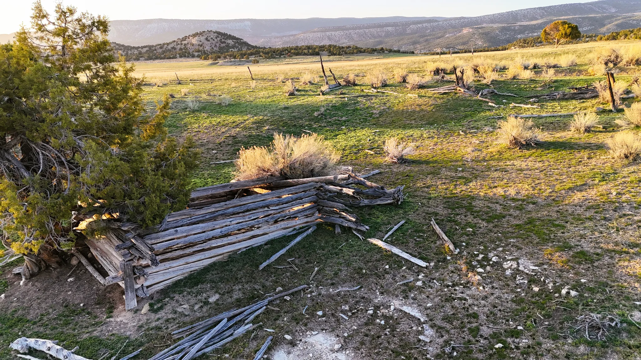 View of mountain backdrop featuring rural landscape