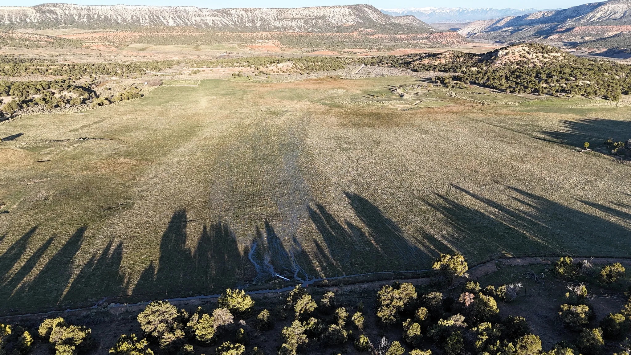 Drone / aerial view of a mountainous background