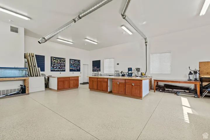 Garage featuring visible vents