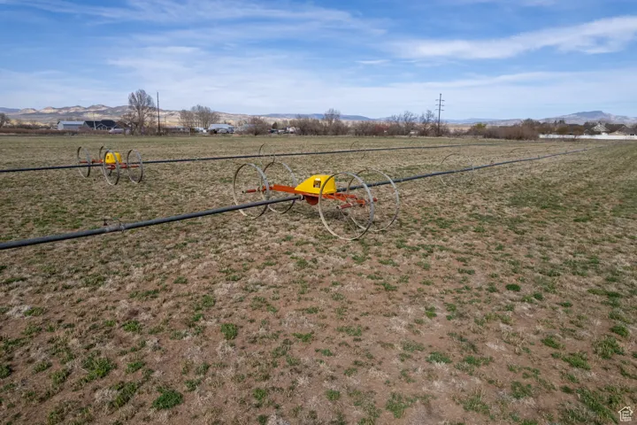 View of yard featuring a mountain view and a rural view