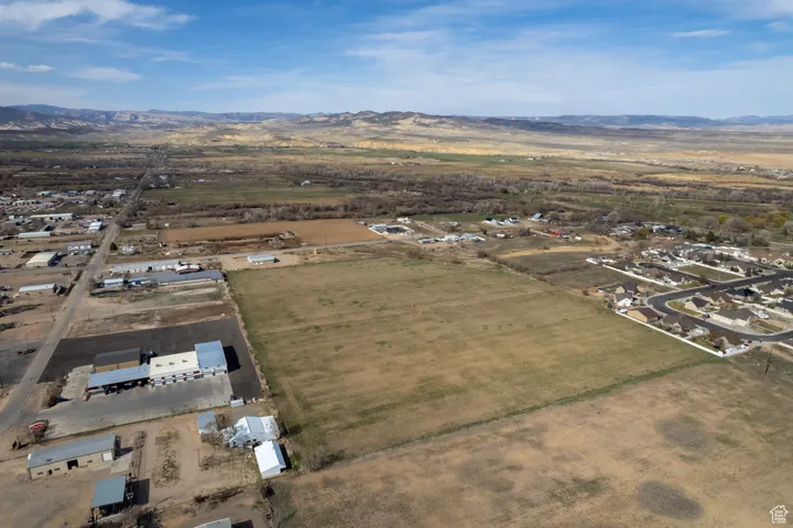 Aerial view with a mountain view and a rural view