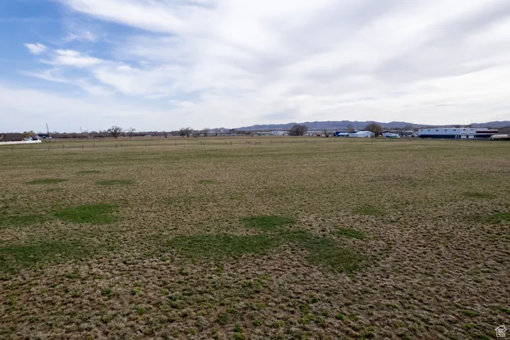 View of yard with a rural view