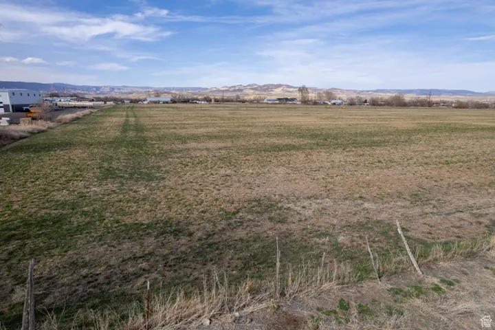 Exterior space with a rural view and a mountain view