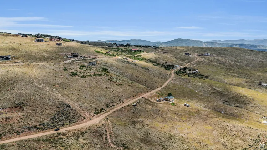 Drone / aerial view featuring a mountain view and a rural view