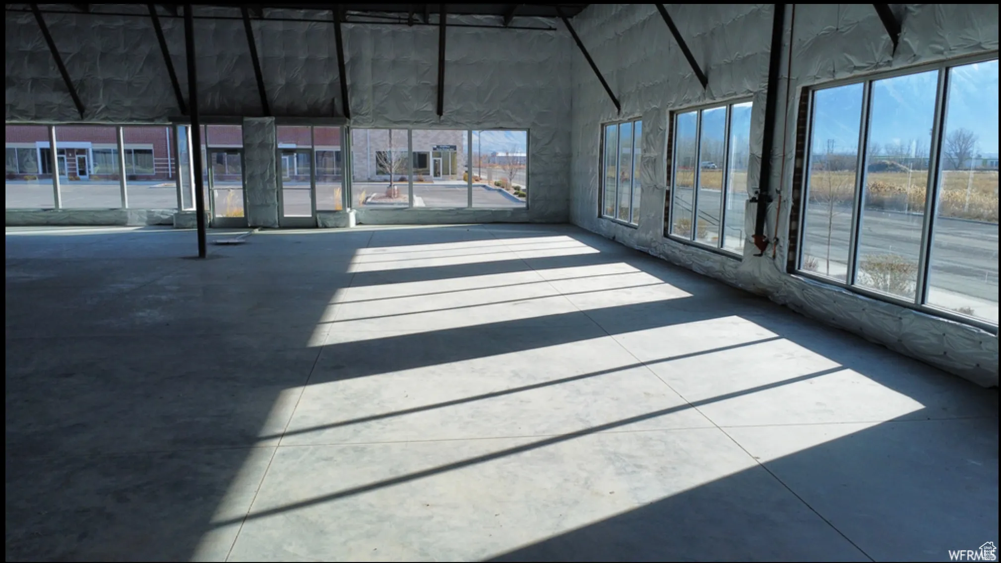 Unfurnished sunroom with a healthy amount of sunlight
