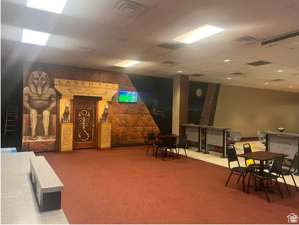 Interior space with visible vents and carpet