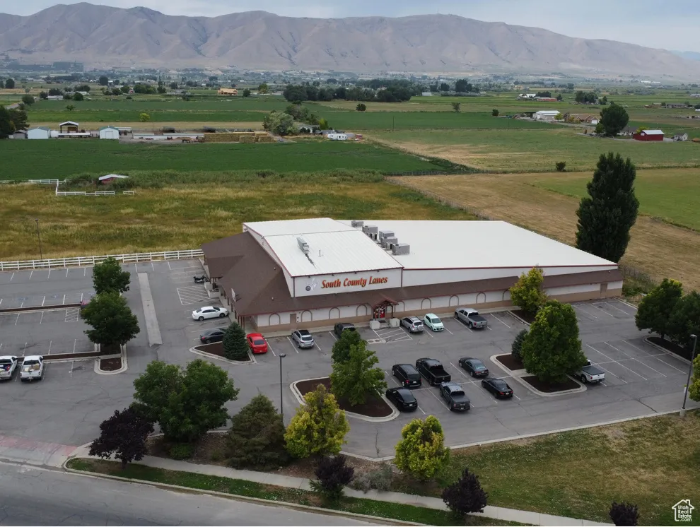 Drone / aerial view with a mountain view and a rural view