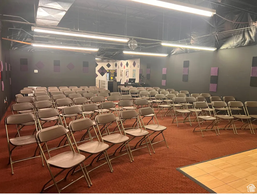 Miscellaneous room with carpet flooring