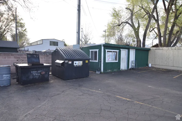 Shed, grease collection and trash container