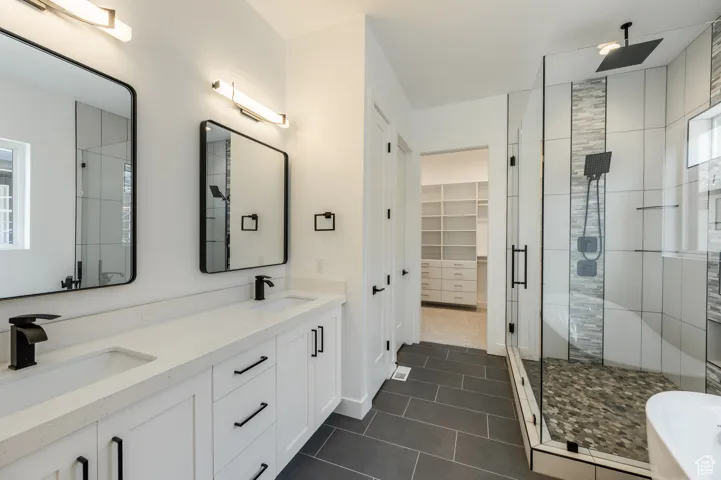 Primary bath with double vanity, and a stall shower