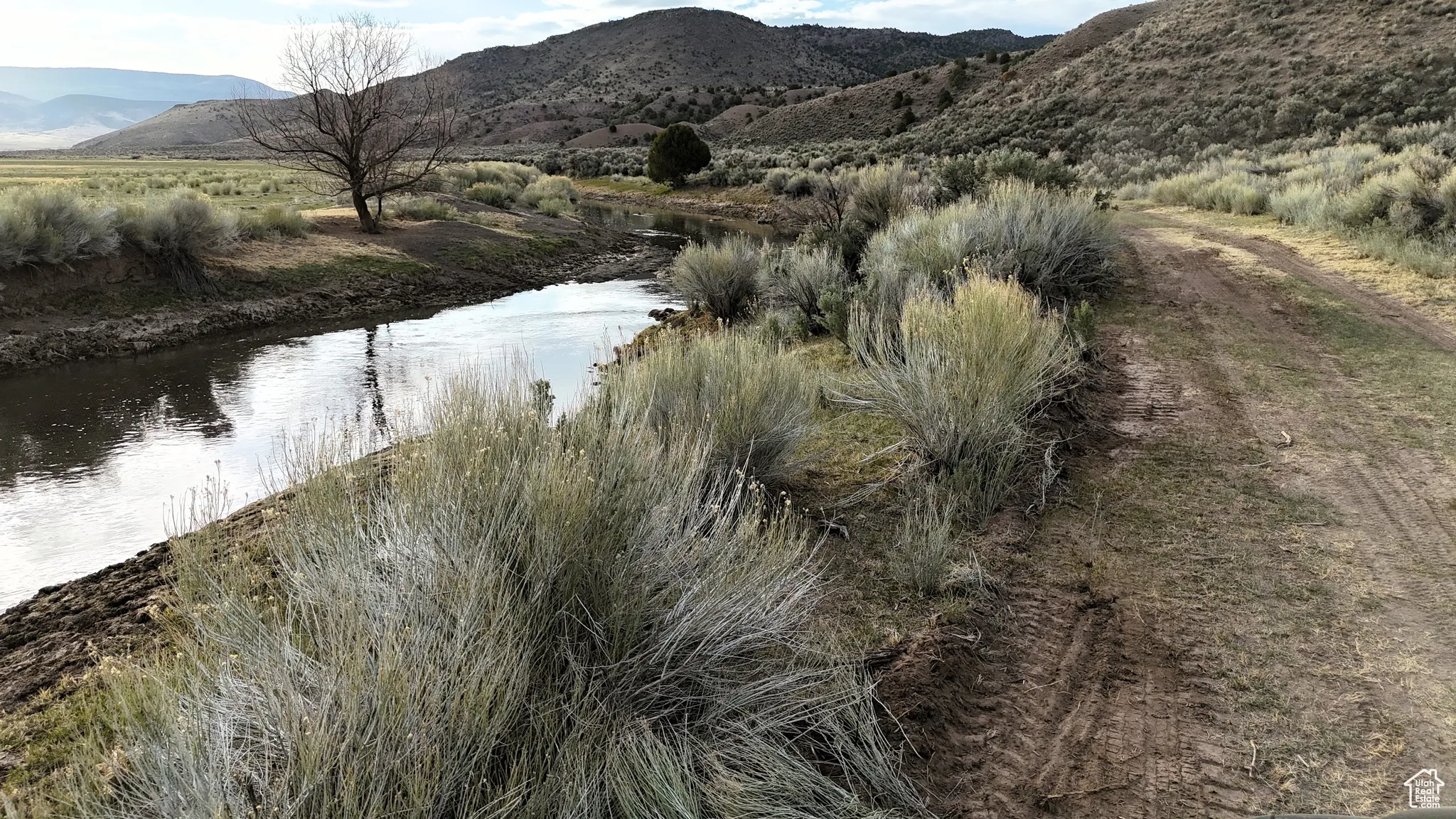 Property view of water with a mountain view
