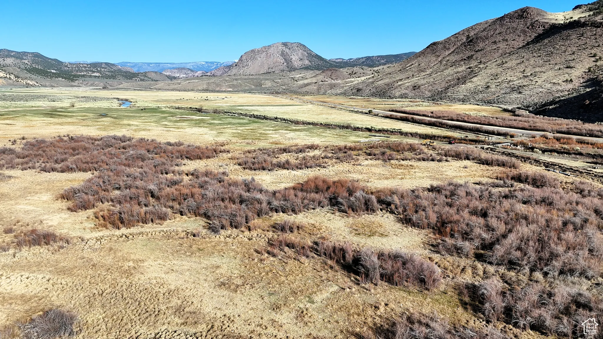 Property view of mountains with a rural view