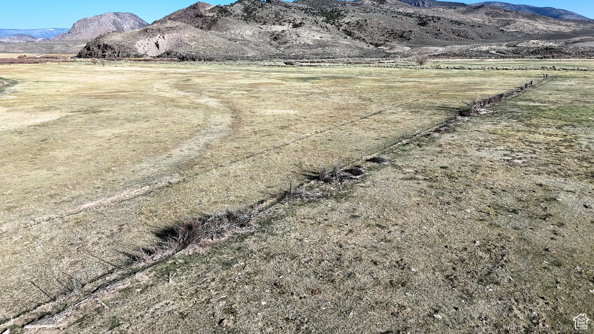 Property view of mountains with a rural view