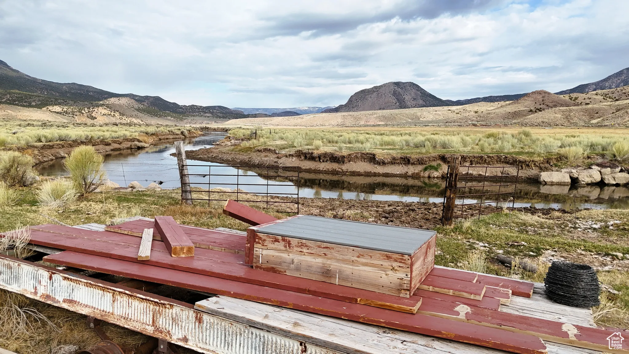 Dock area with a deck with water view