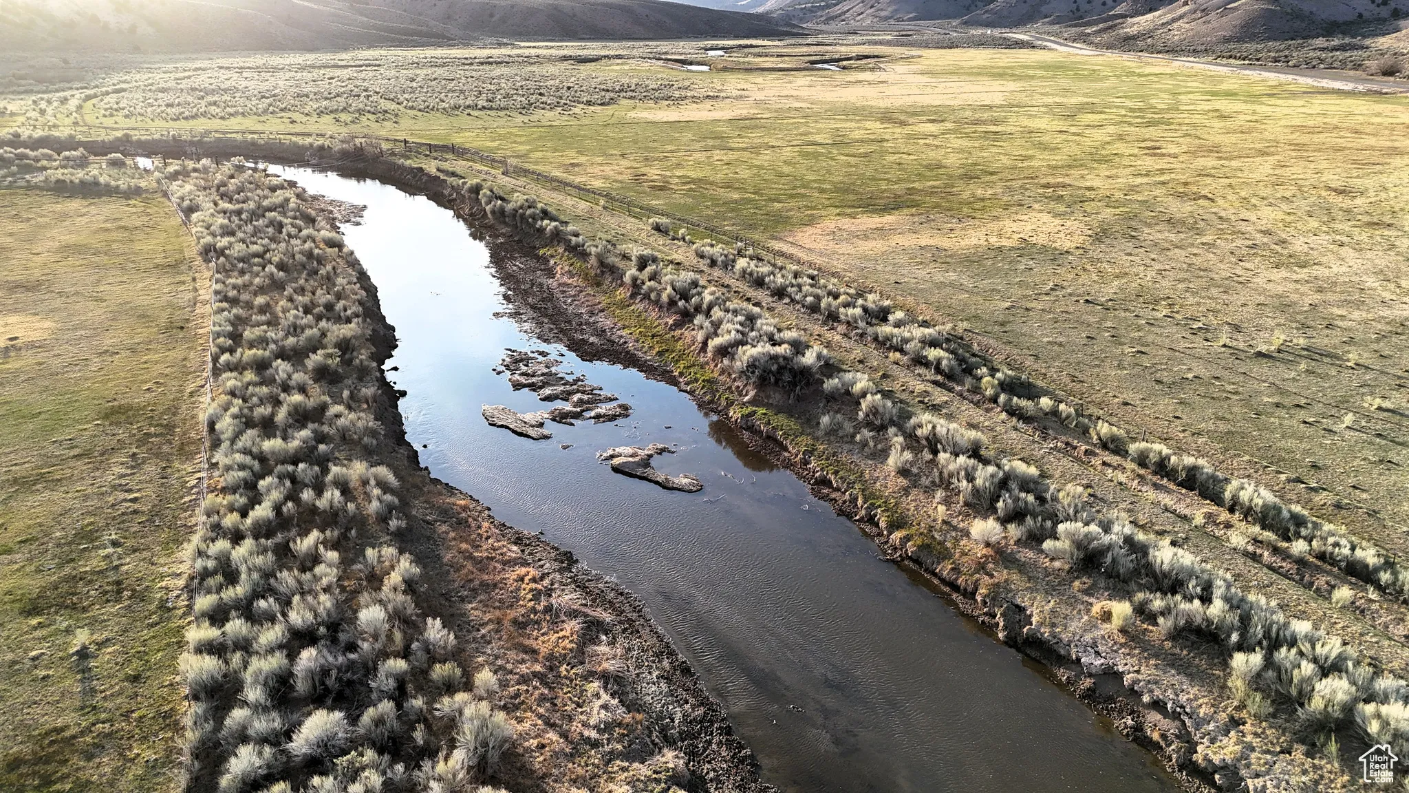 Aerial view with a water and mountain view
