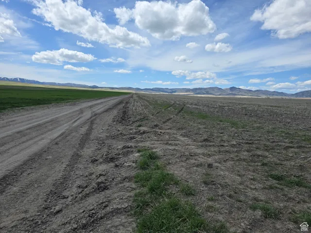 View of road featuring a rural view and a mountain view