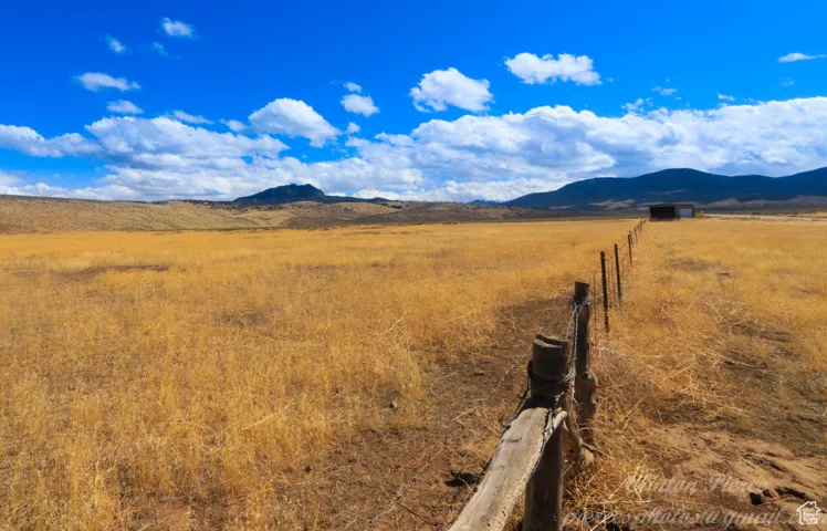 Property view of mountains featuring a rural view