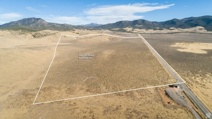 Bird's eye view featuring a mountain view, a rural view, and view of desert