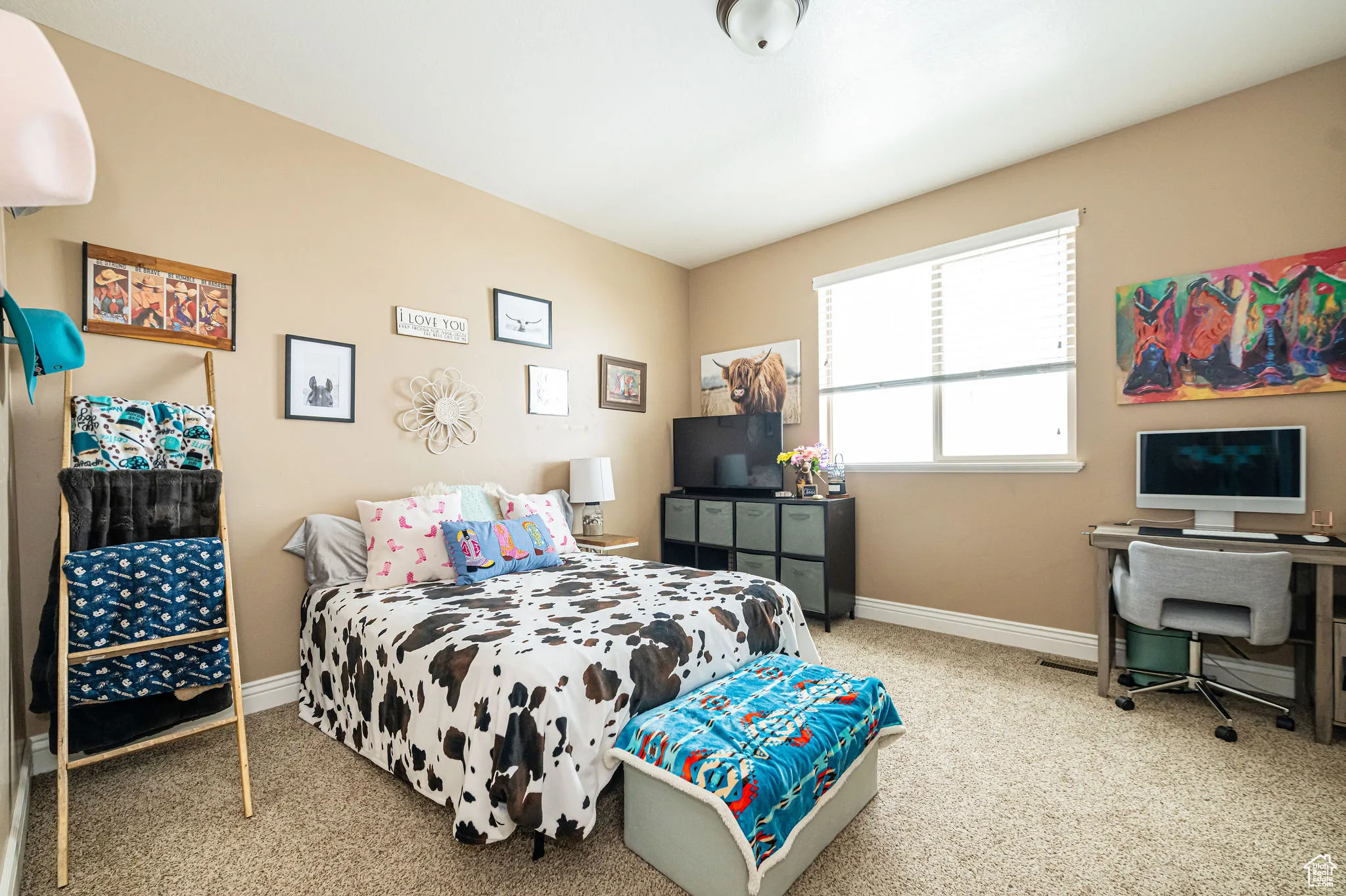 Bedroom with carpet floors and baseboards