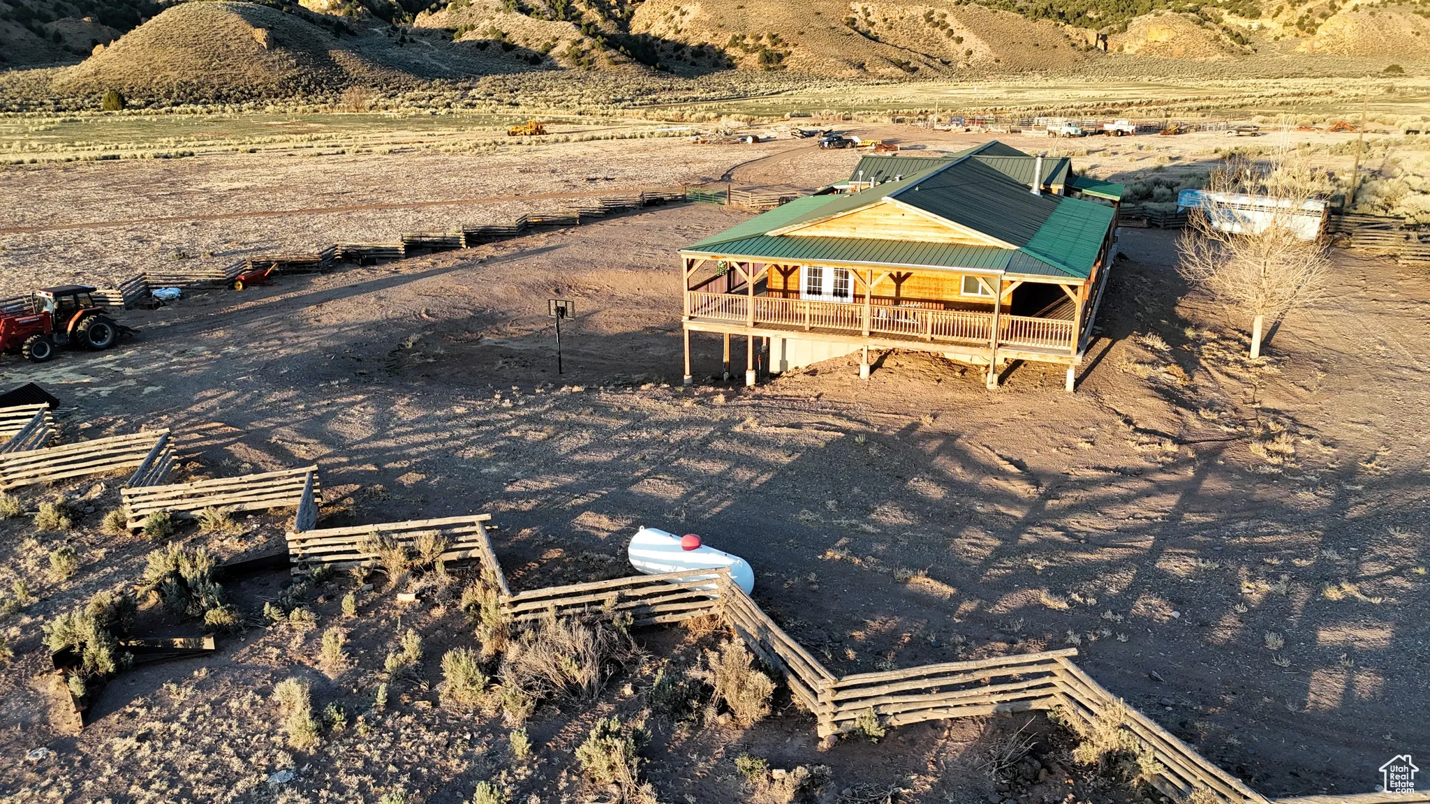 Rear view of house featuring a view of countryside and metal roof