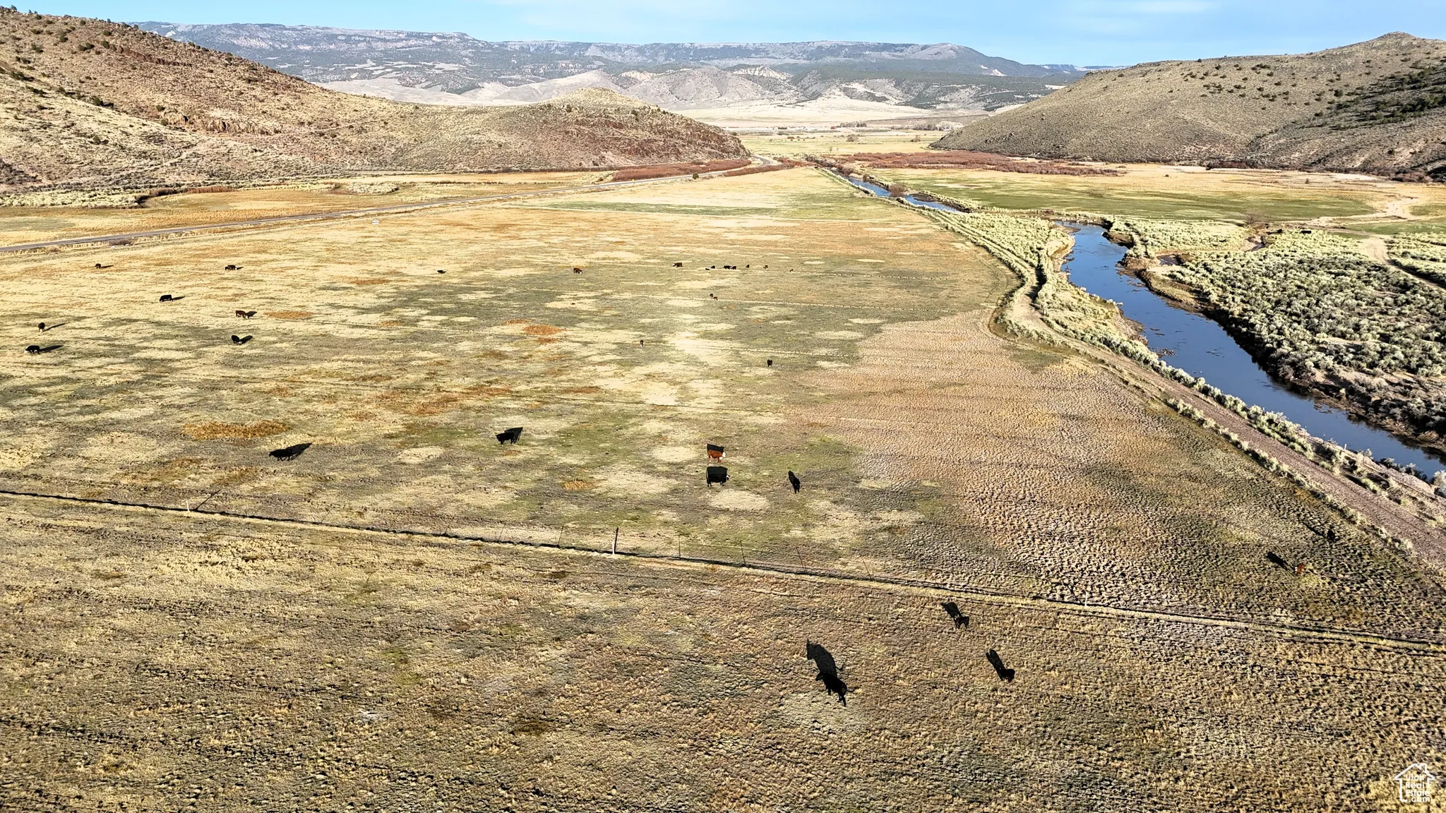 View of property location with a water and mountain view