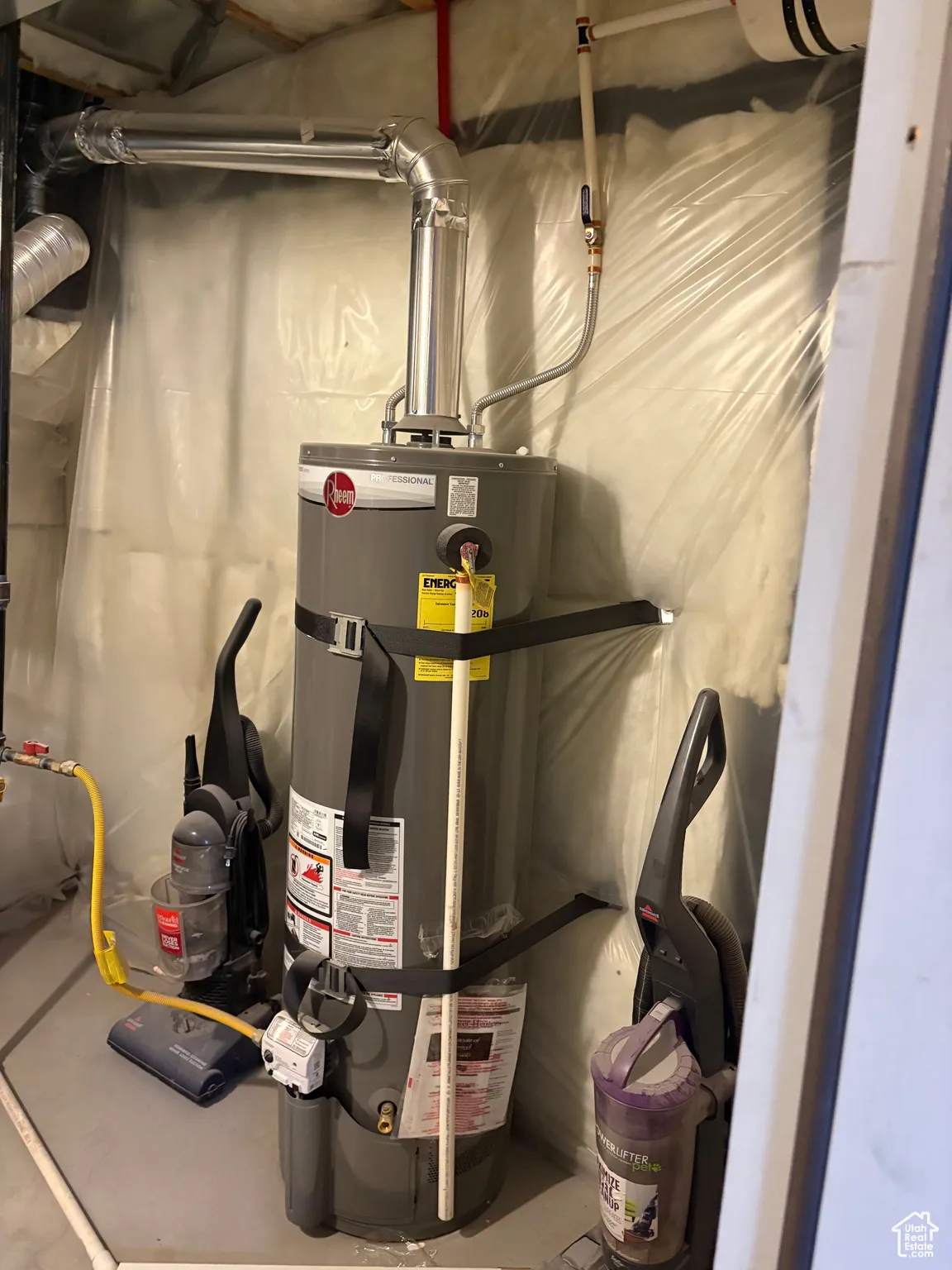 Utilities featuring strapped water heater