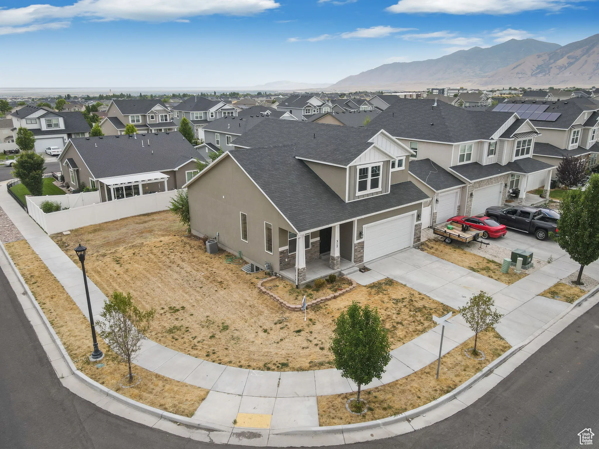 Aerial view of residential area featuring mountains