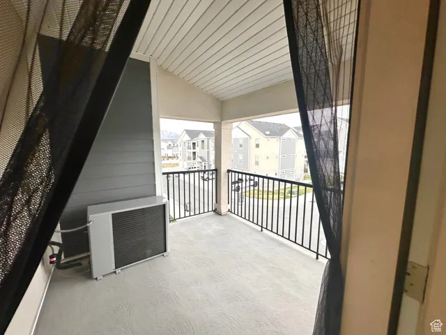 Balcony featuring a residential view