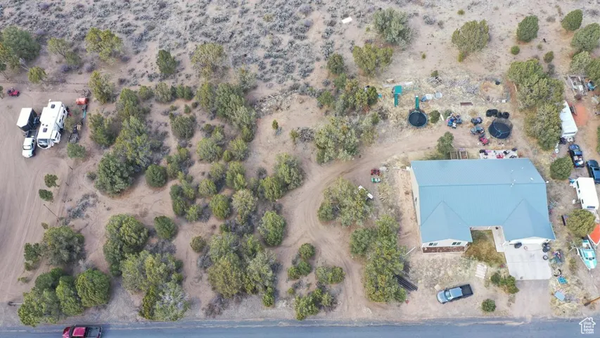 Birds eye view of property with view of desert