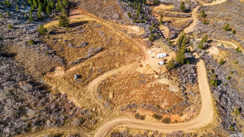 Birds eye view of property featuring a rural view