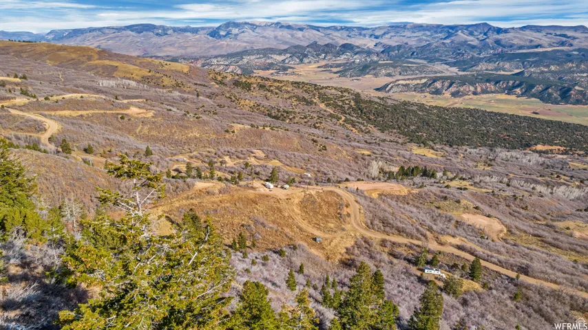 Aerial view featuring a mountain view