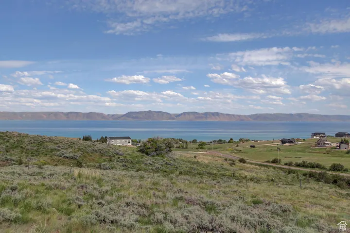 Mountain view featuring a water view